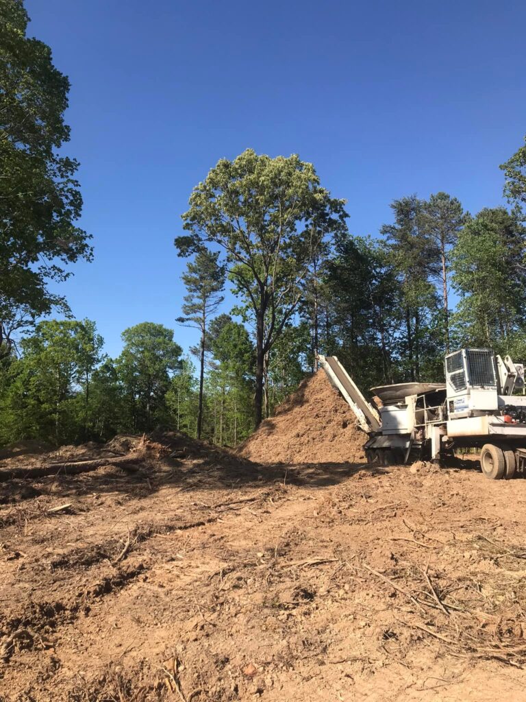 Elder's grinder hard at work in a clearing of dirt